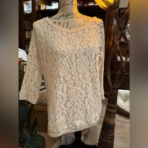 Cute Lacey top two layers size medium cream color! Great shape!